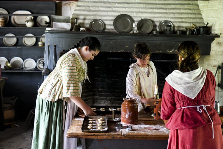 Women preparing a meal in Historic Richmondtown
